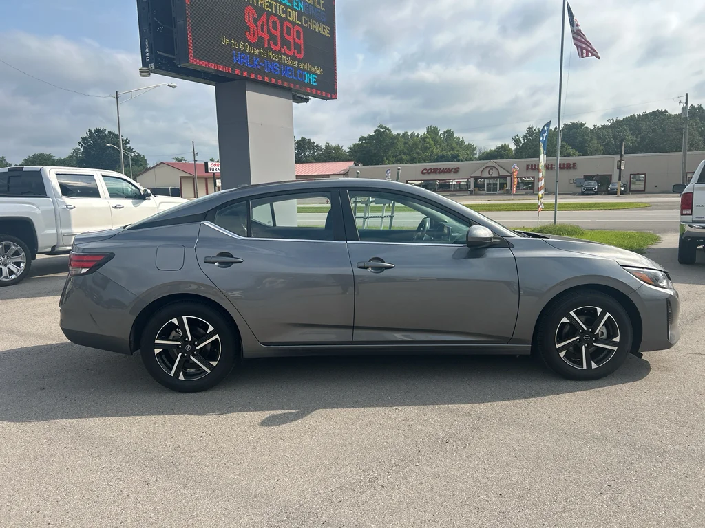 Used 2024 Gun Metallic Nissan SV image 3
