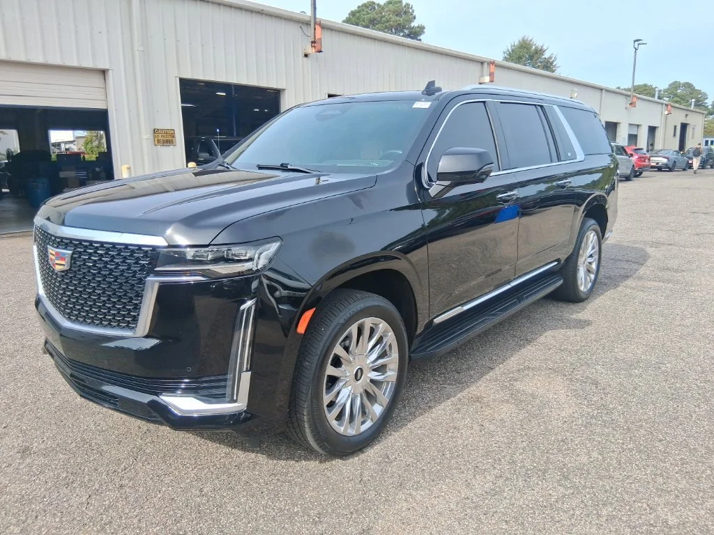 Used 2023 Black Cadillac Premium image 1