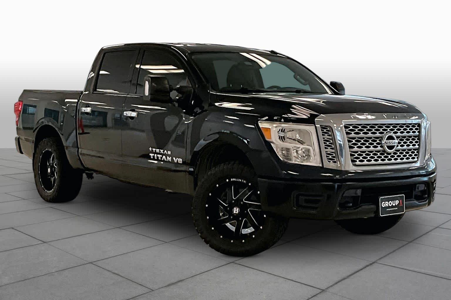 Used 2019 Magnetic Black Metallic Nissan SV image 2
