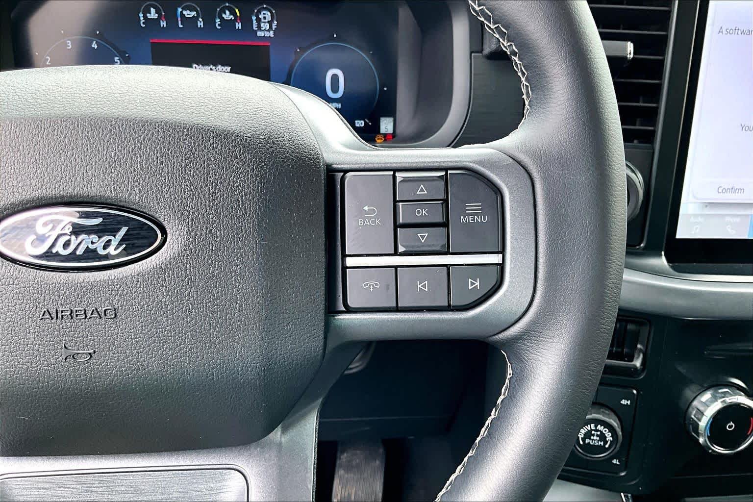 Used 2025 Agate Black Metallic Ford XLT image 25