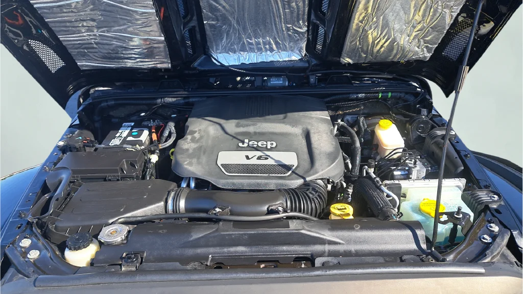 Used 2015 Black Jeep Unlimited Sahara image 16