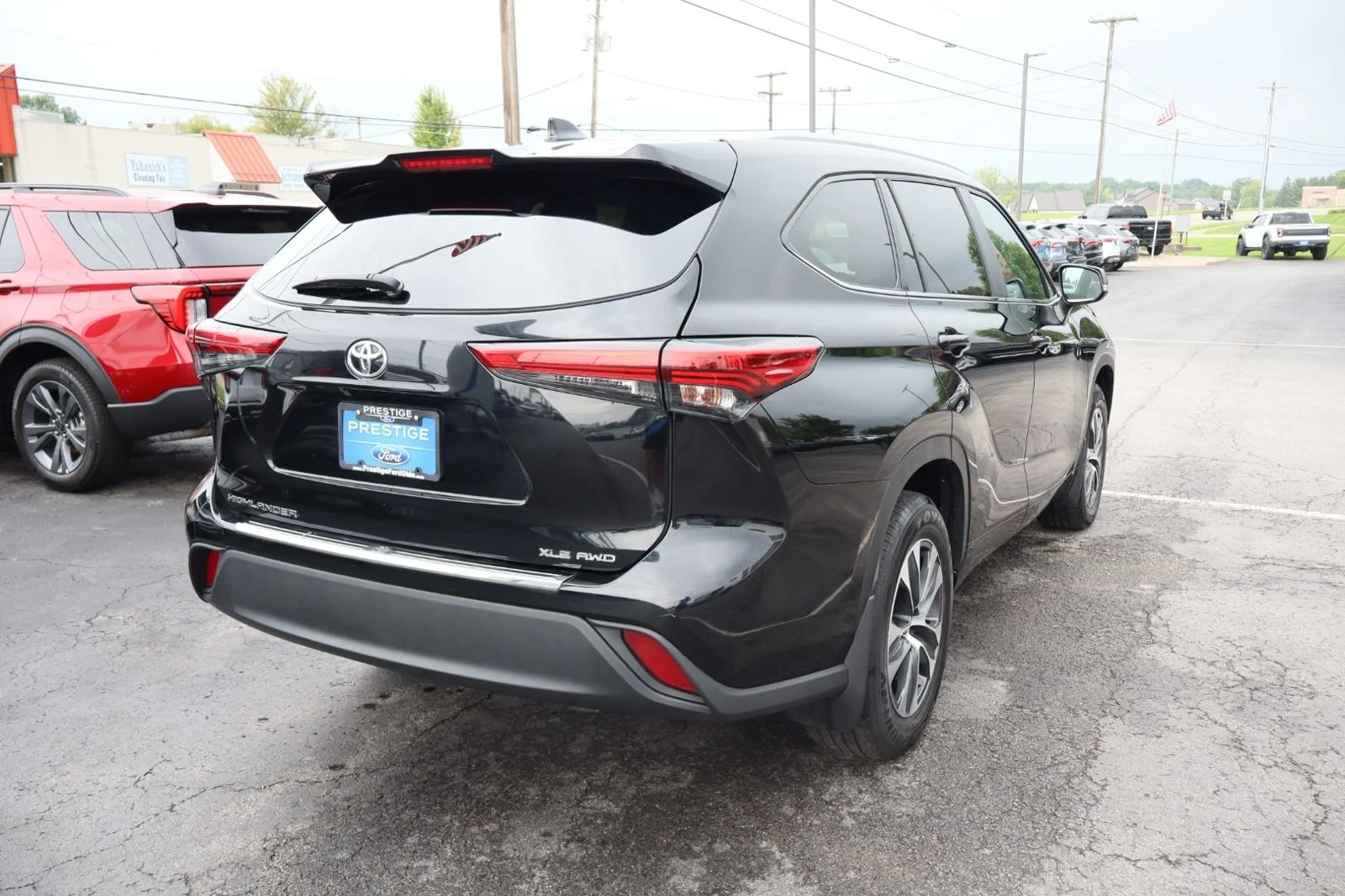 Used 2023 Midnight Black Metallic Toyota XLE image 8