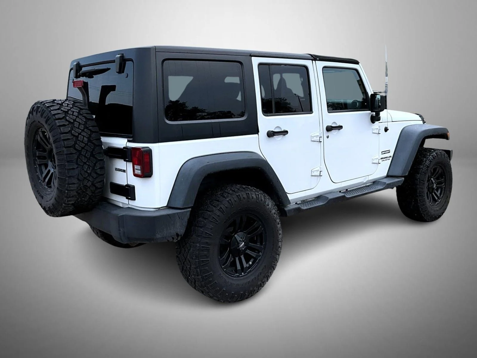Used 2013 White Jeep Unlimited Sport image 5
