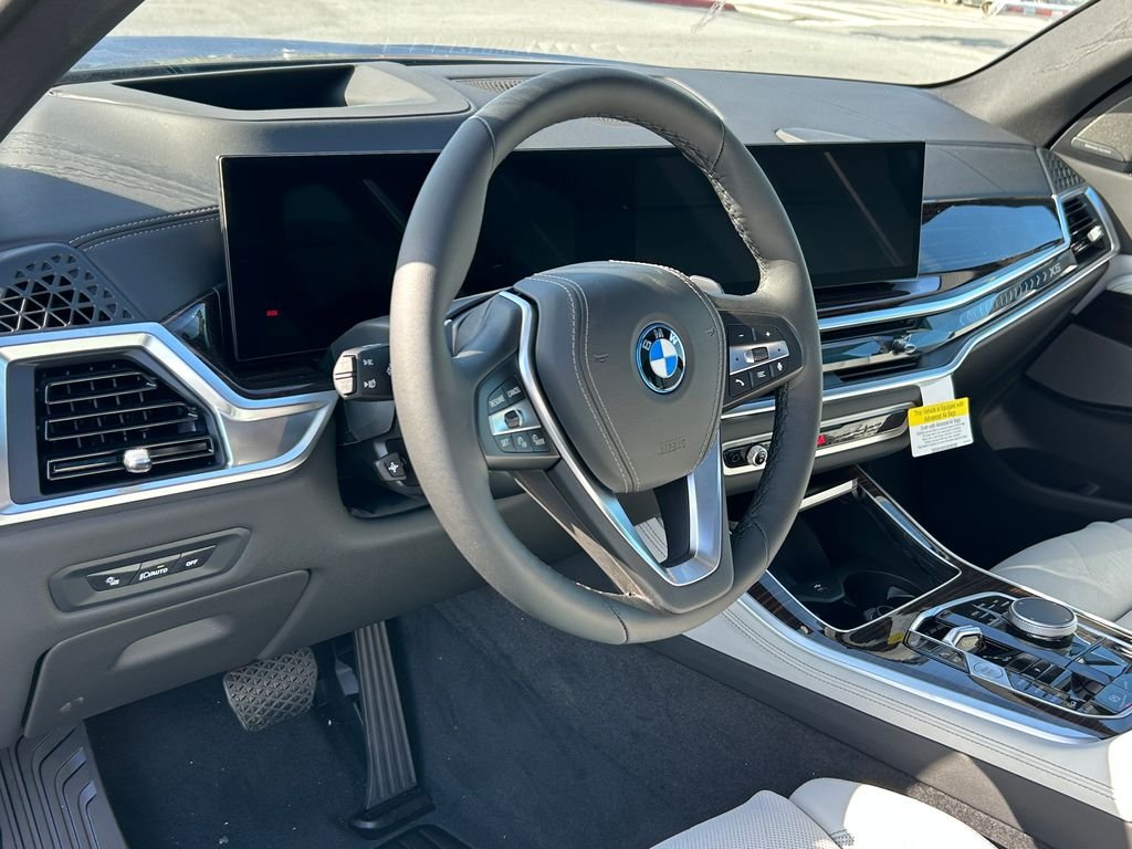 New 2026 Tanzanite Blue II Metallic BMW xDrive50e image 13