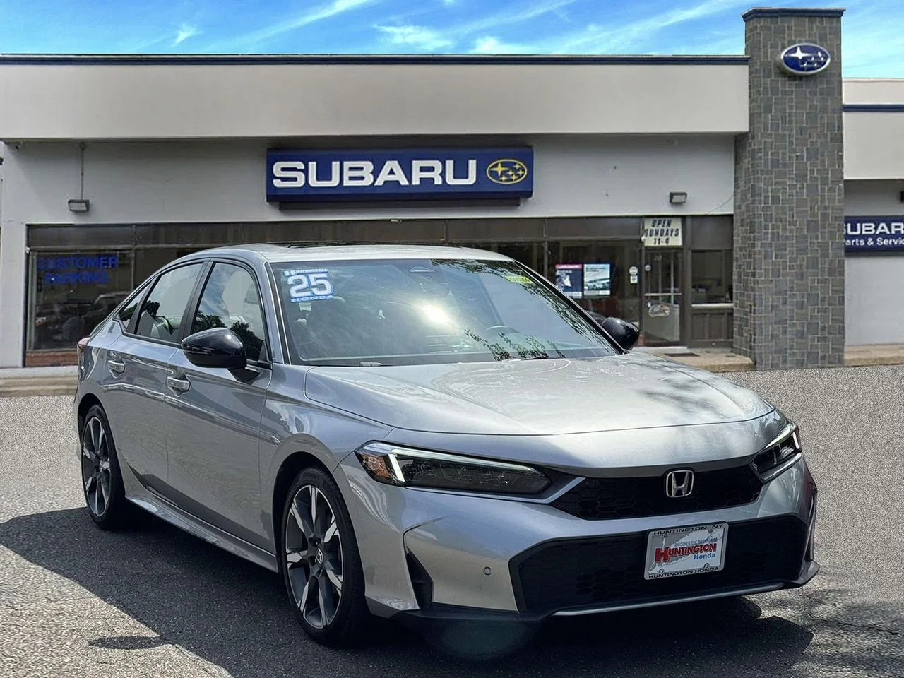 Used 2025 Solar Silver Metallic Honda Sport image 1