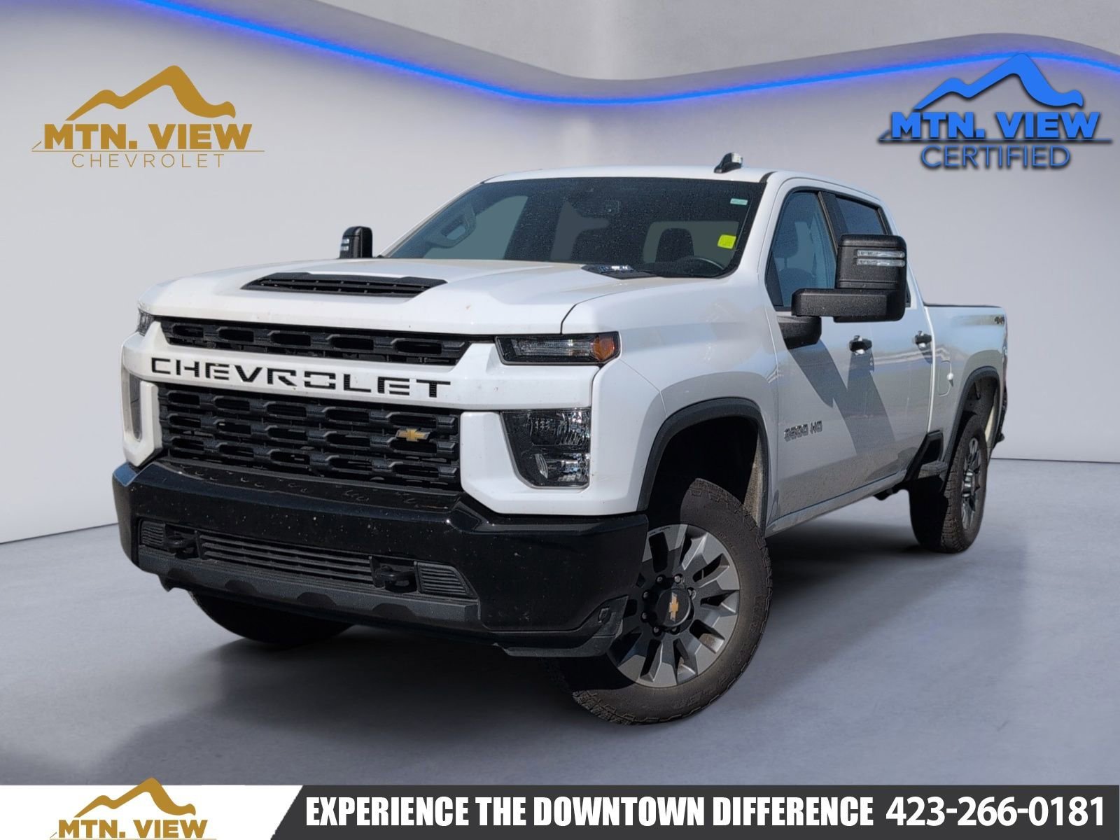 Summit White 2023 Chevrolet Silverado 2500HD Custom Crew Cab 4WD Pickup Truck Four-Wheel Drive