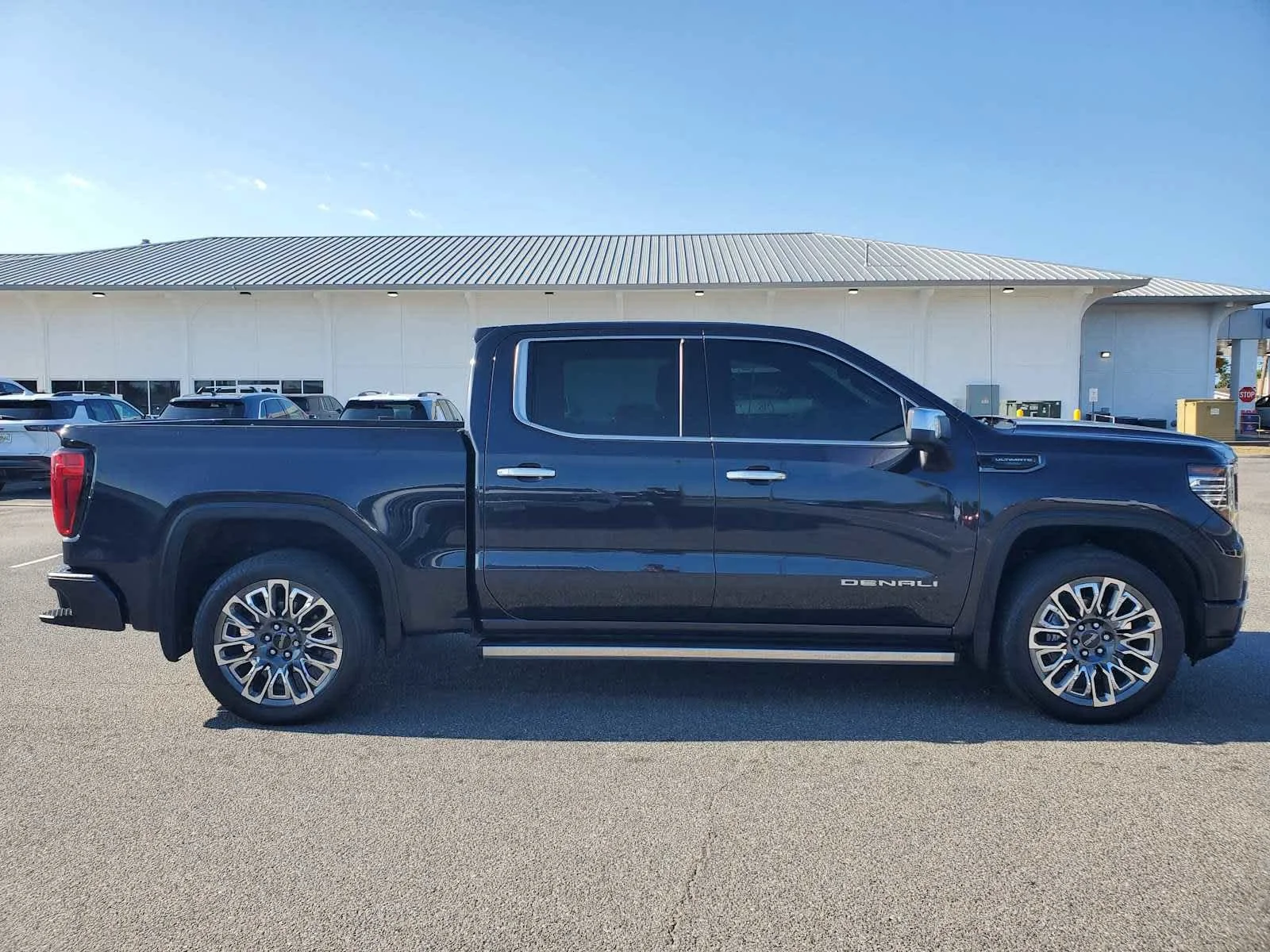 Used 2023 Titanium Rush Metallic GMC Denali Ultimate image 2