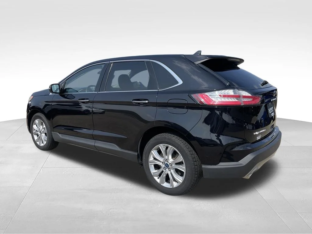 Used 2021 Black Metallic Ford Titanium image 6