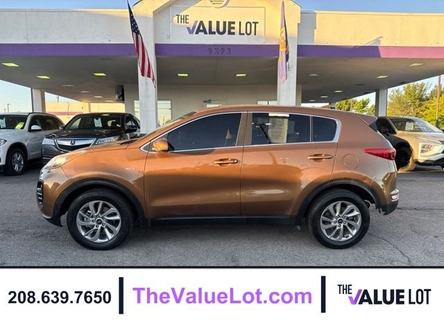 Used 2018 Brown Kia LX image 1