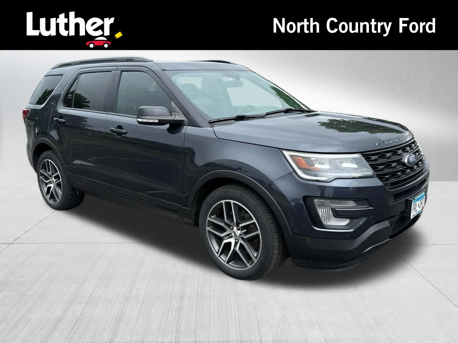 Used 2017 Smoked Quartz Metallic Tinted Clearcoat Ford Sport image 1