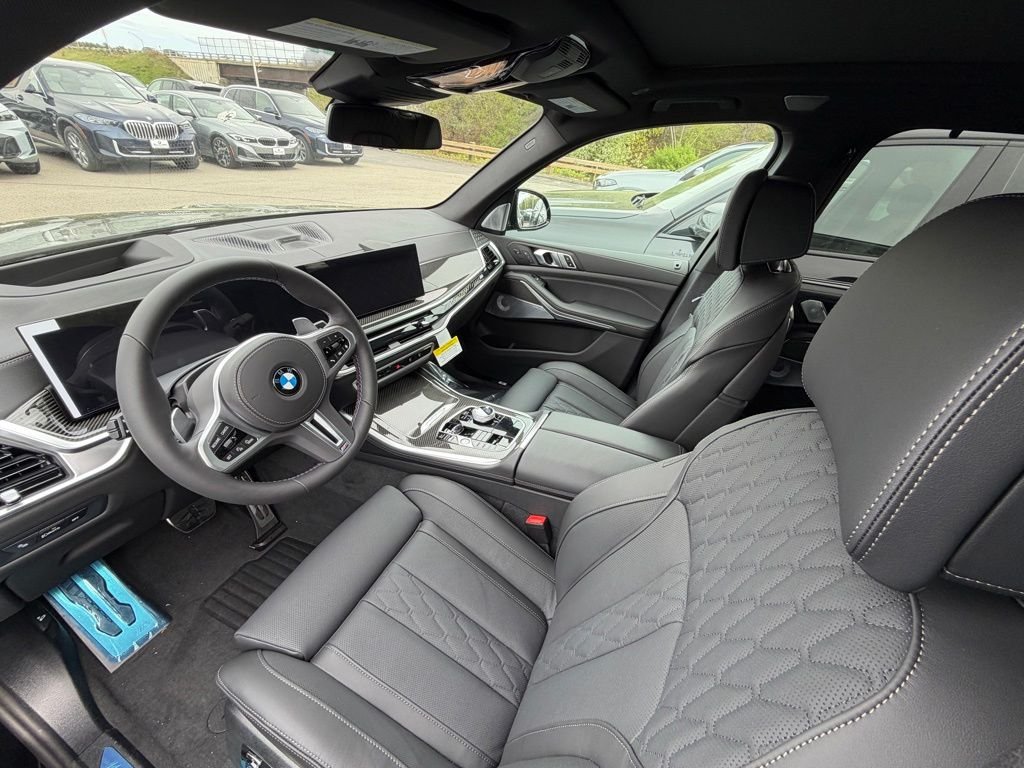 New 2026 Black Sapphire Metallic BMW M60i image 5