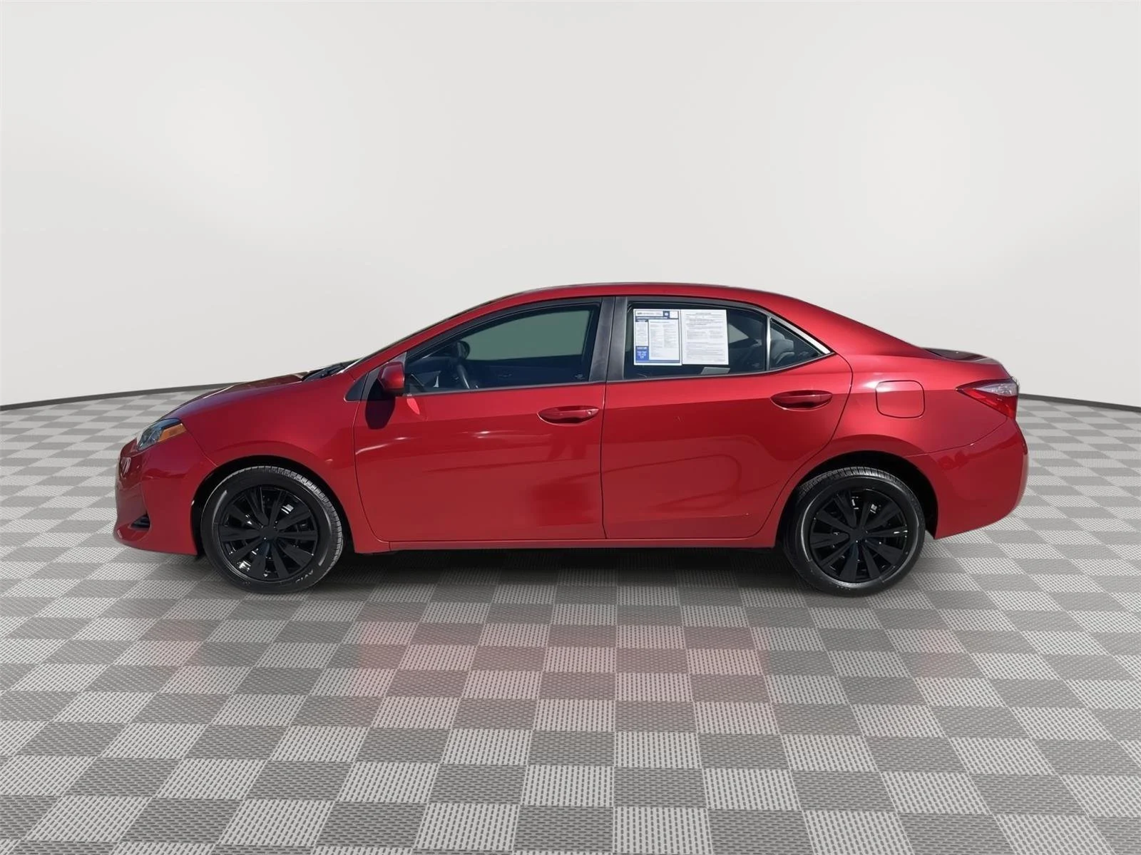Used 2018 Barcelona Red Metallic Toyota LE image 5