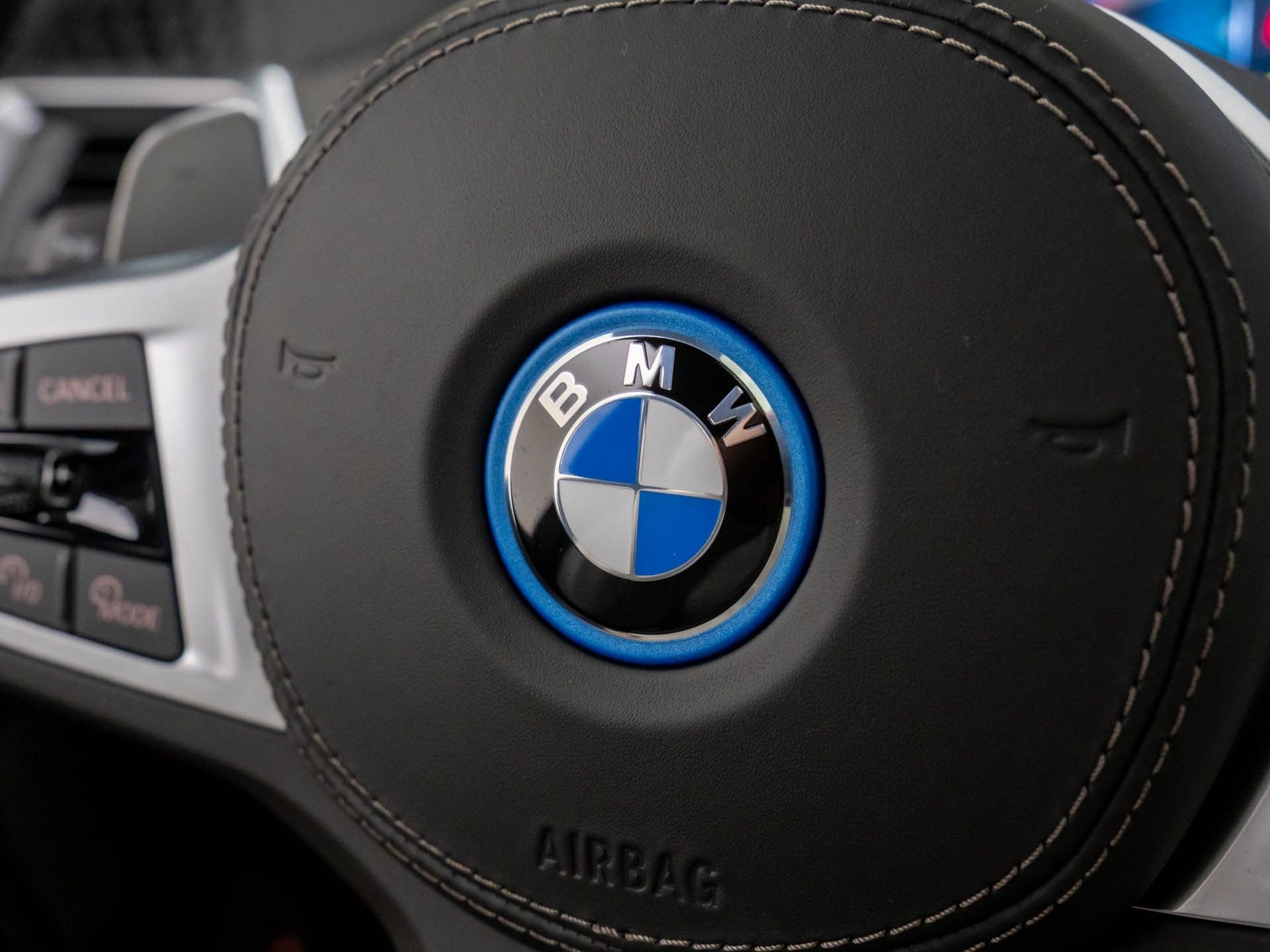 New 2026 Black Sapphire Metallic BMW xDrive50e image 24