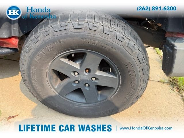 Used 2009 Sunburst Orange Pearl Jeep Unlimited X image 3