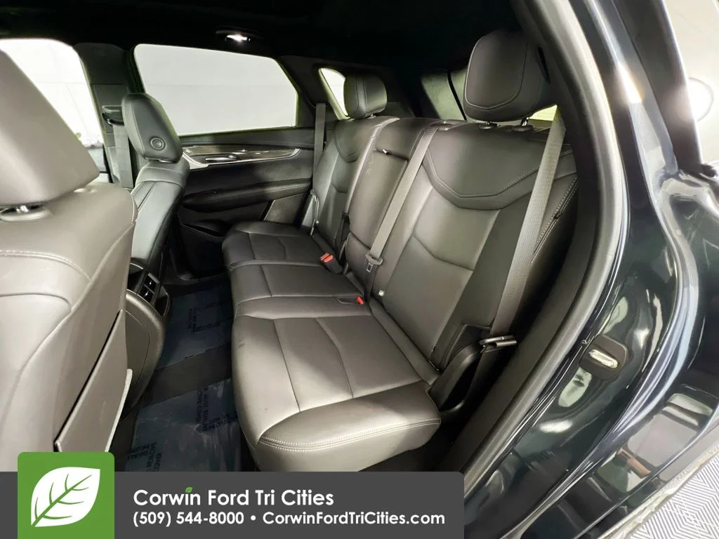 Used 2023 Stellar Black Metallic Cadillac Sport image 29