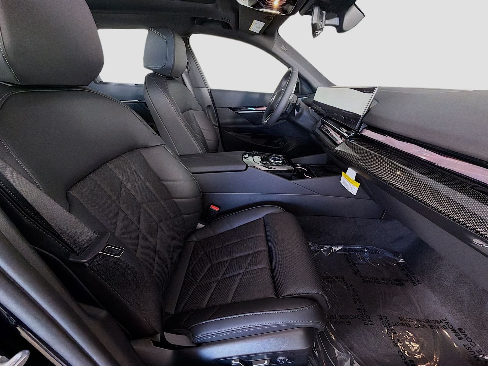 New 2027 Black Sapphire Metallic BMW 550e xDrive image 29