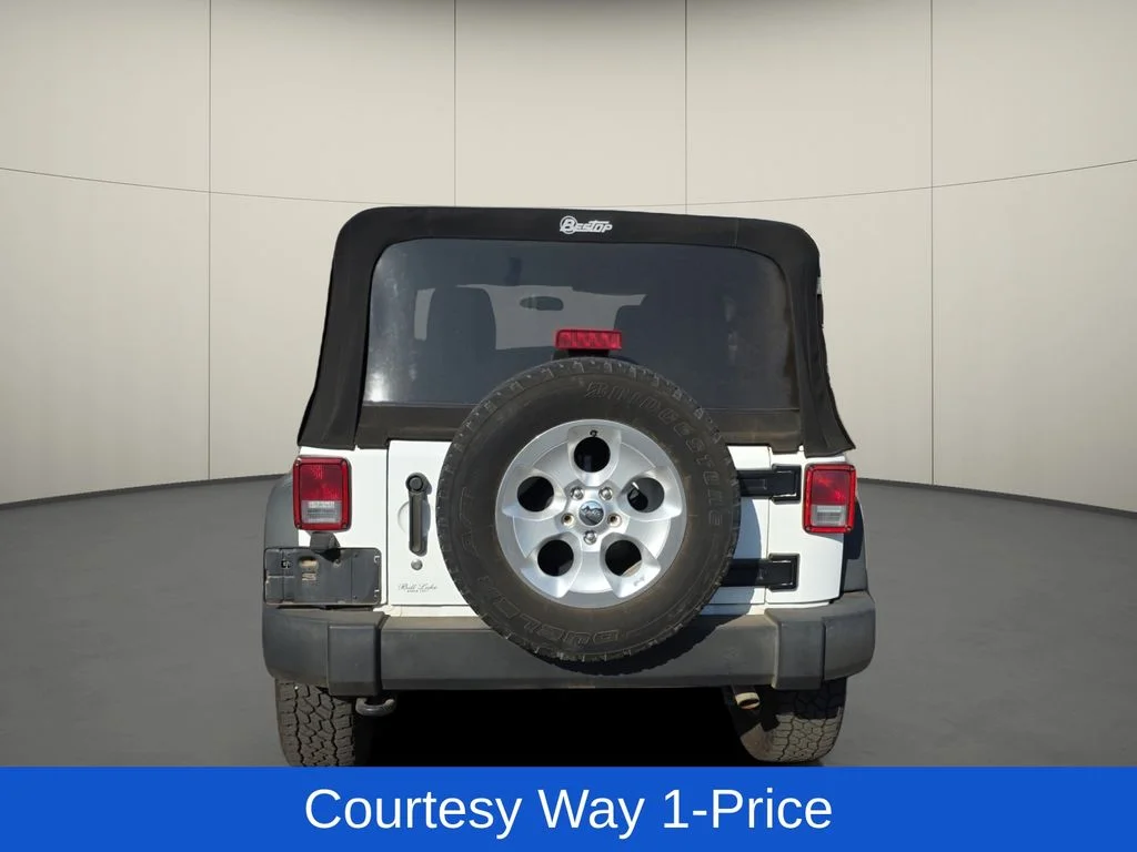 Used 2013 White Jeep Unlimited Sport image 9