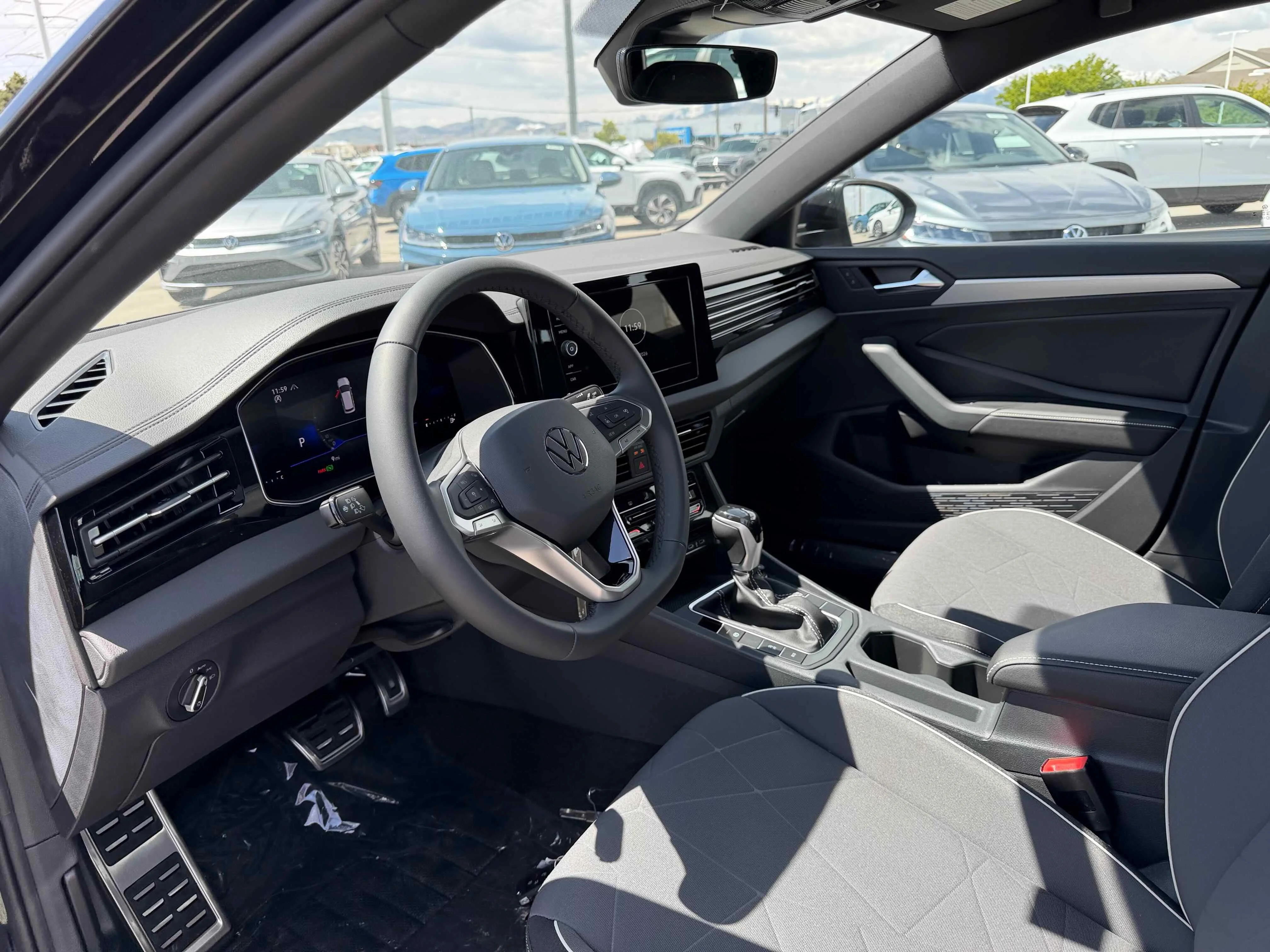 New 2026 Deep Black Volkswagen Sport image 3