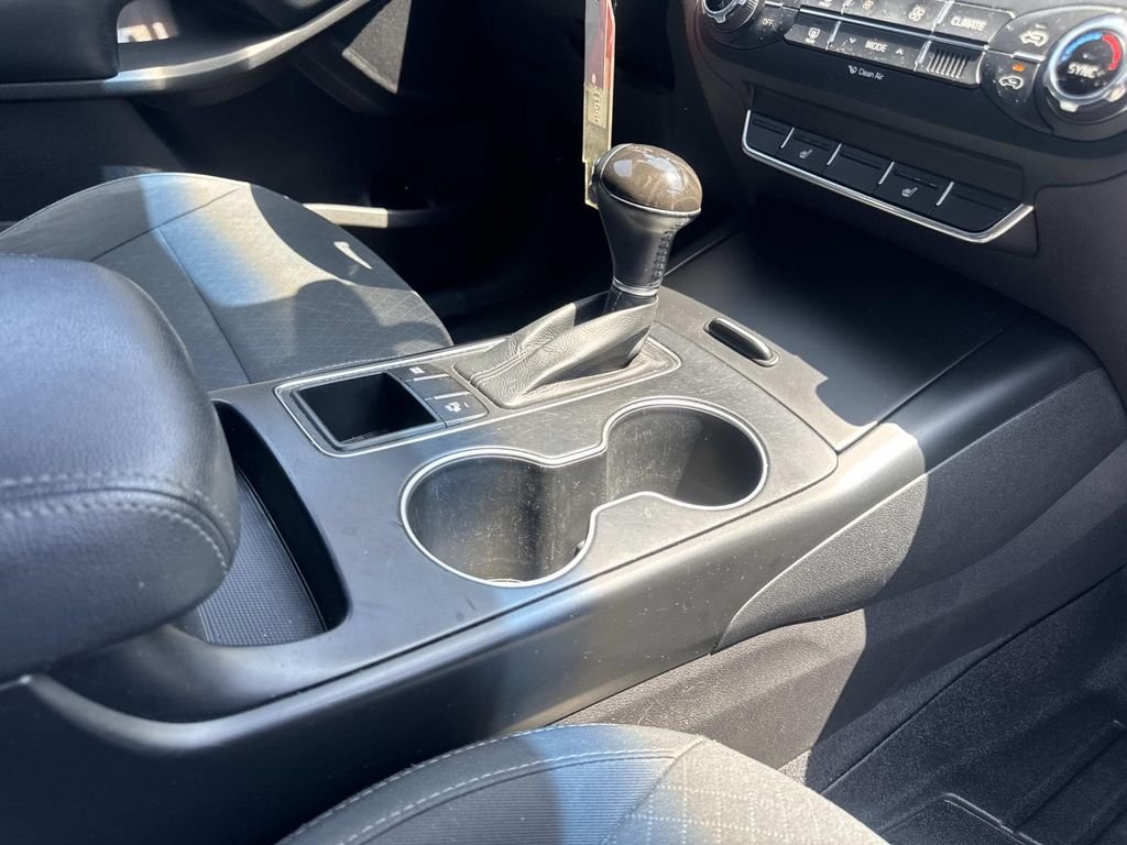 Used 2017 Titanium Silver Kia LX image 28