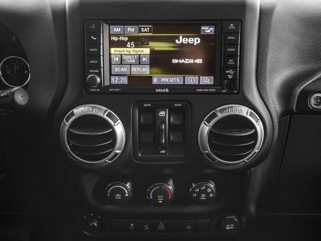 Used 2016 Billet Silver Metallic Clearcoat Jeep Rubicon Hard Rock image 13