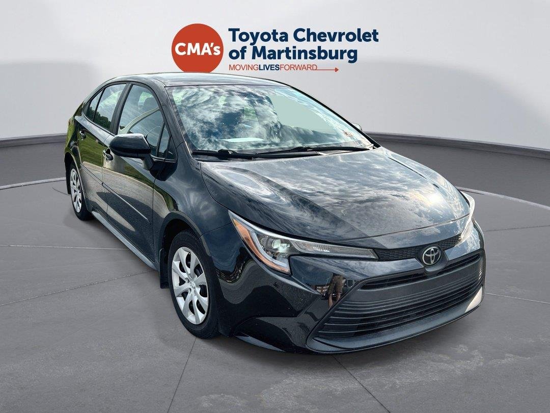 Certified Used 2025 Midnight Black Metallic Toyota LE image 1