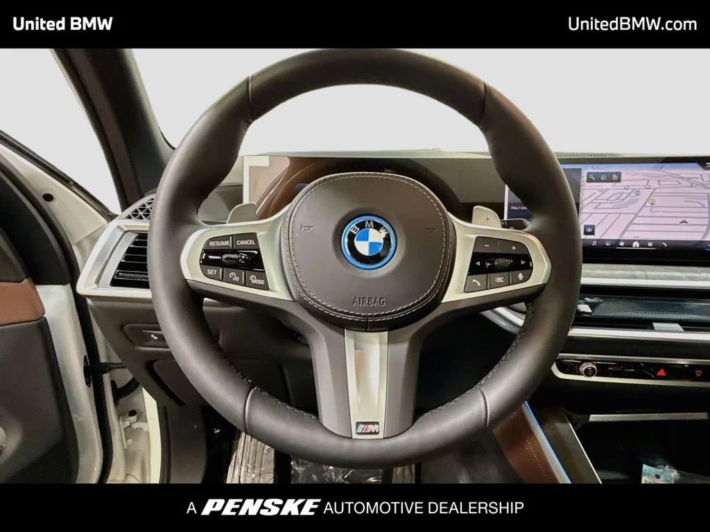 New 2026 Mineral White Metallic BMW xDrive50e image 13