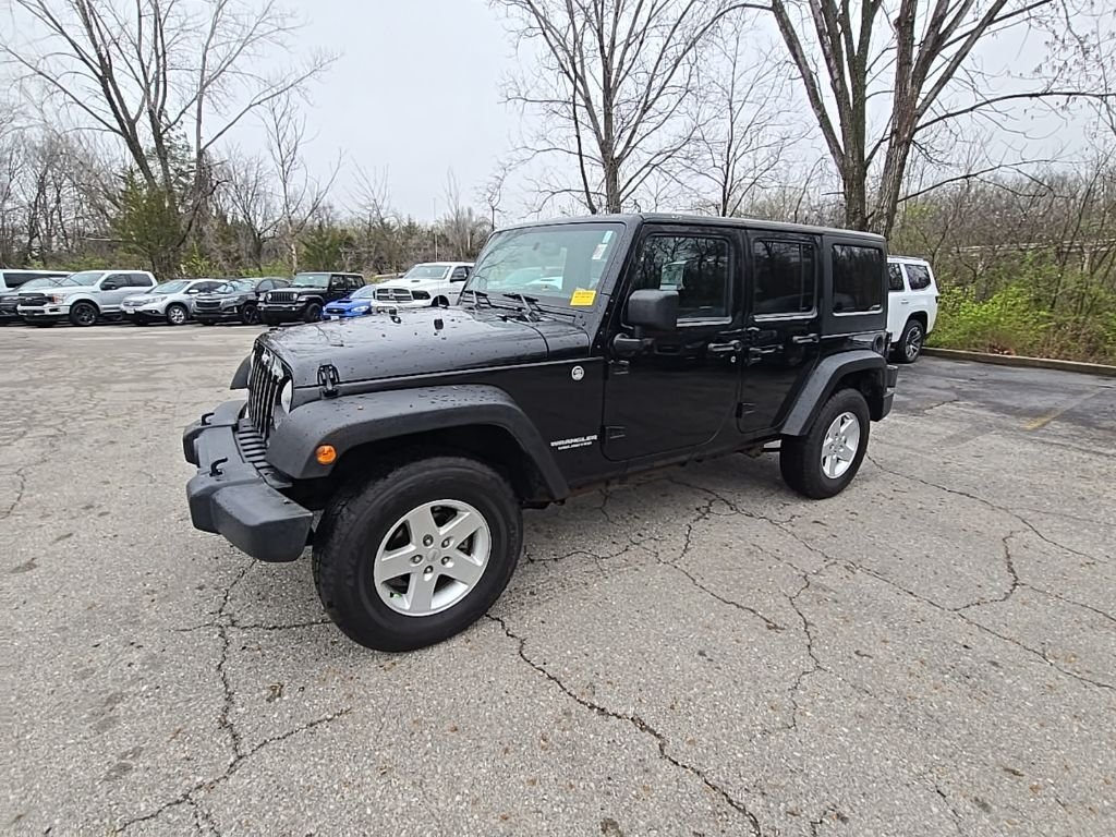 Used 2013 Jeep Wrangler Unlimited Sport with VIN 1C4BJWDG5DL661009 for sale in Kansas City