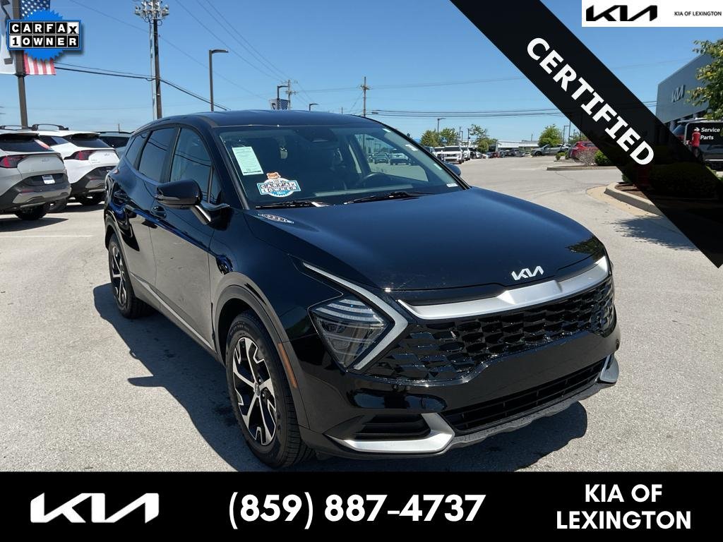 Used 2024 Ebony Black Kia EX image 1