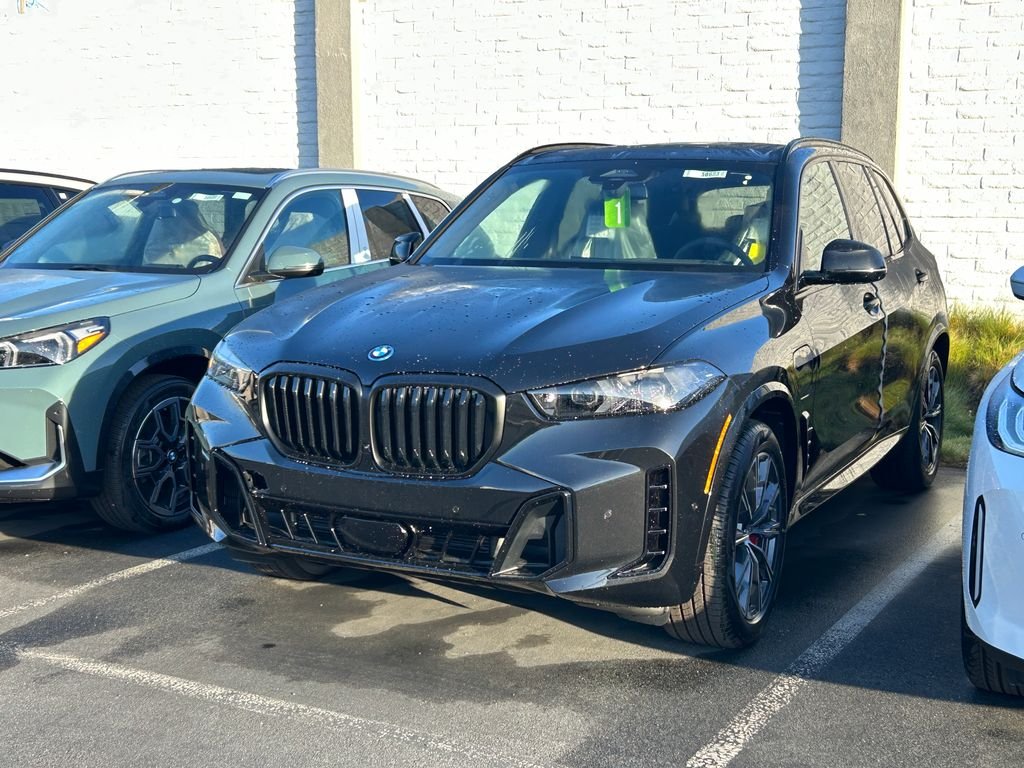 New 2026 Black Sapphire Metallic BMW xDrive50e image 2