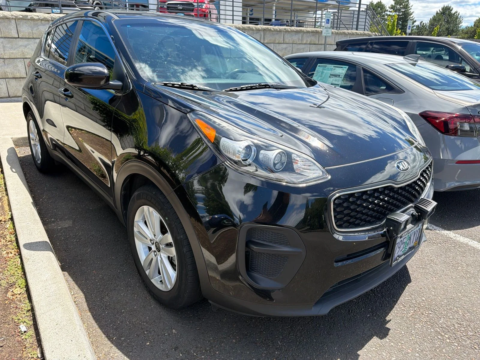Used 2018 Black Cherry Kia LX image 2