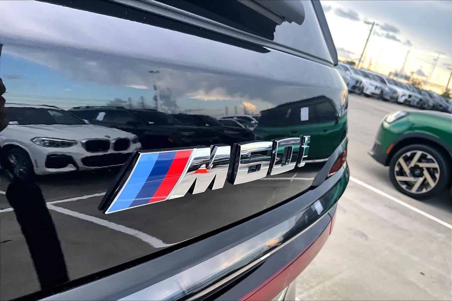 Used 2026 Black Sapphire Metallic BMW M60i image 9