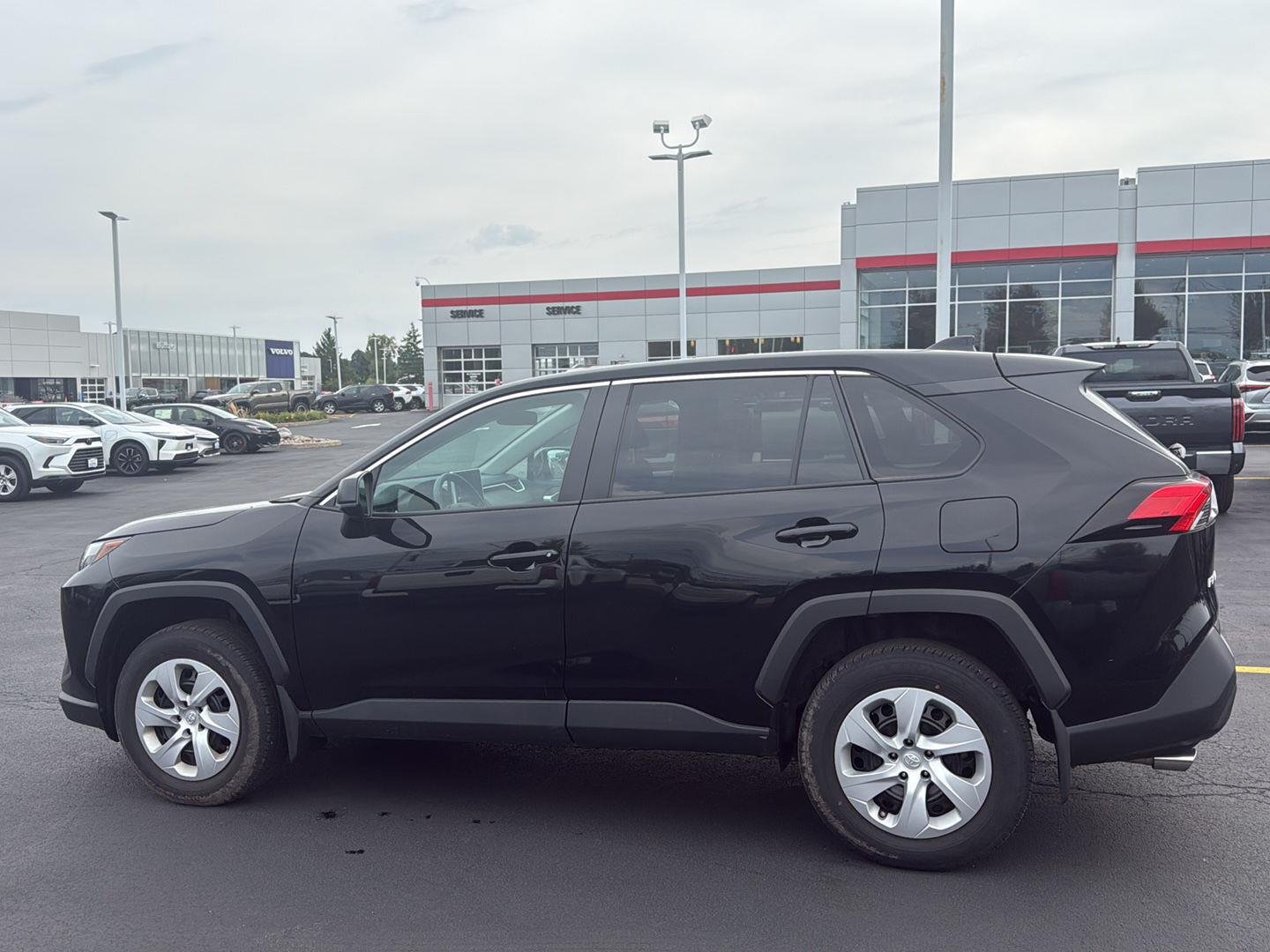 Used 2024 Midnight Black Metallic Toyota LE image 4
