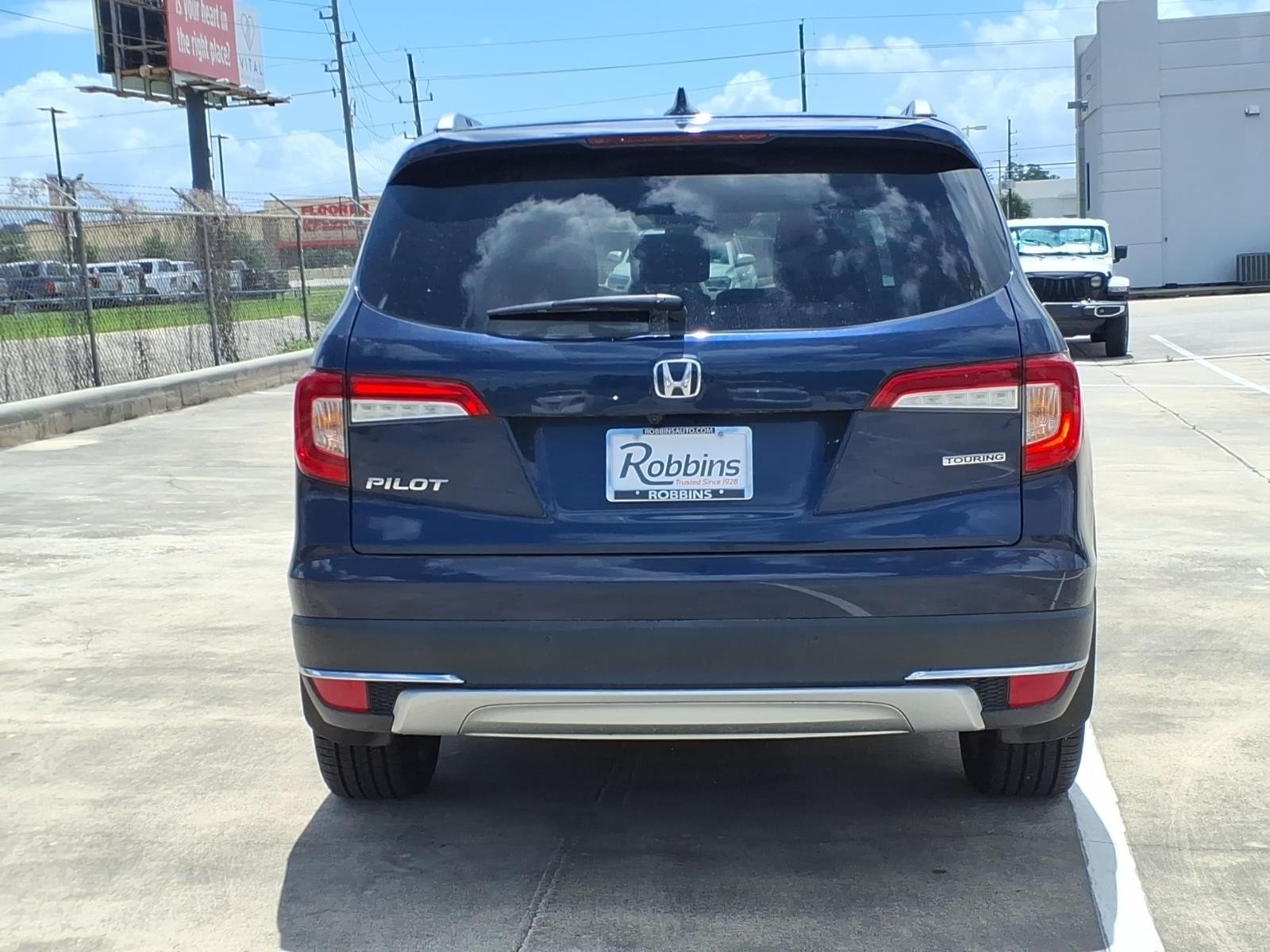 2022 Honda Pilot Touring 7-Passenger Blue at AutoNation Chrysler Jeep Dodge Ram Spring