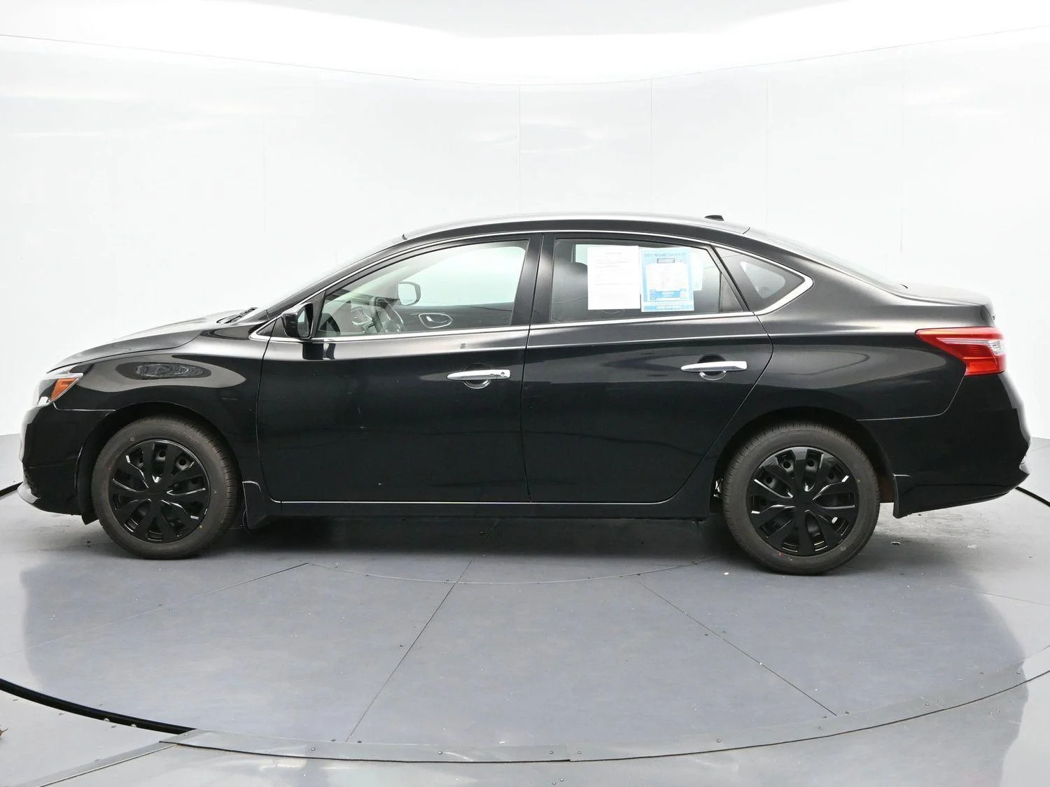 Used 2017 Super Black Nissan SV image 4