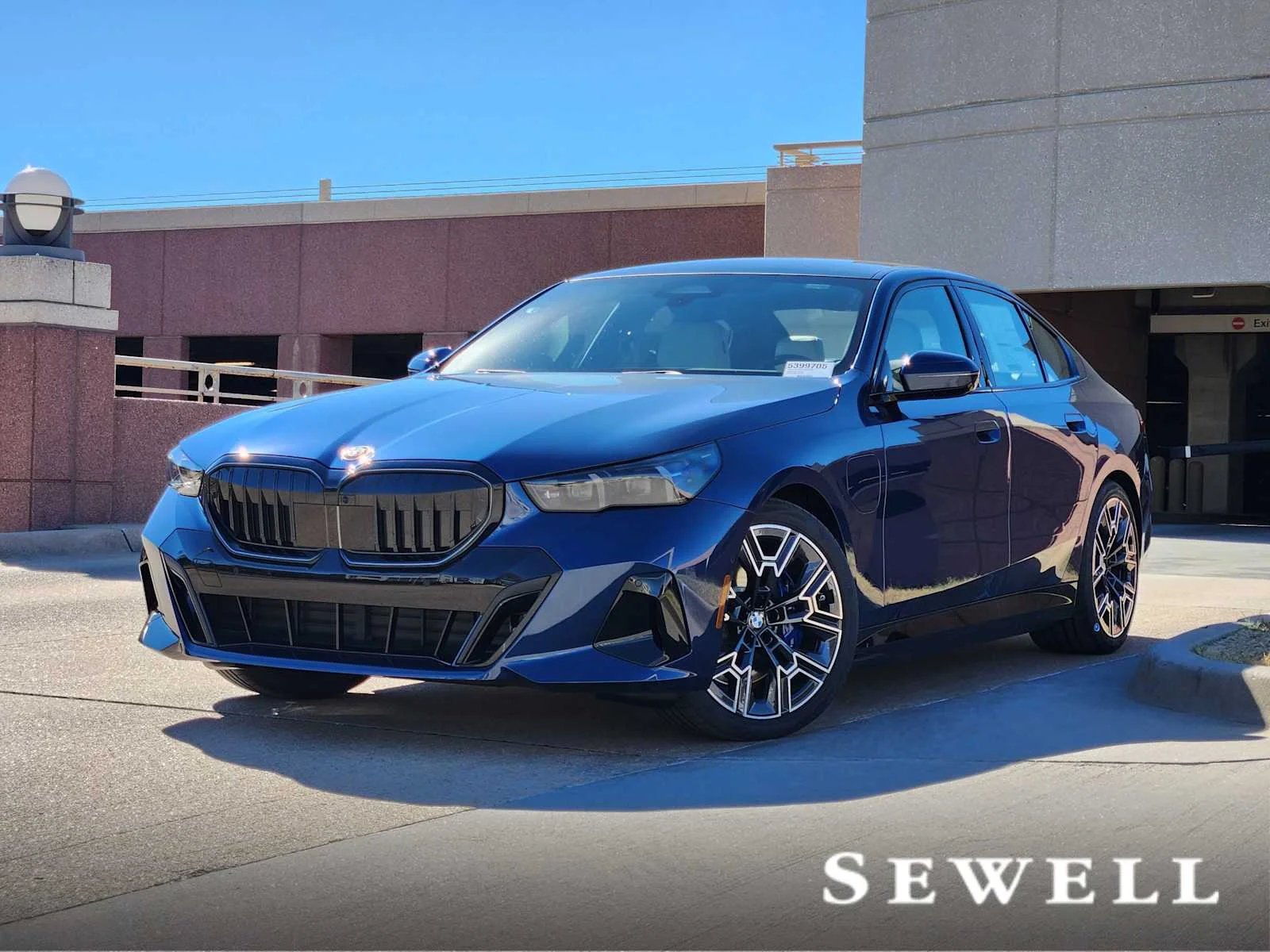 2026 BMW 5 Series 550e xDrive Sedan's photo