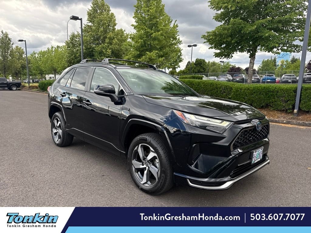 Used 2022 Midnight Black Metallic Toyota SE image 1