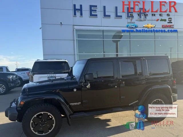 Used 2012 Black Clearcoat Jeep  image 1