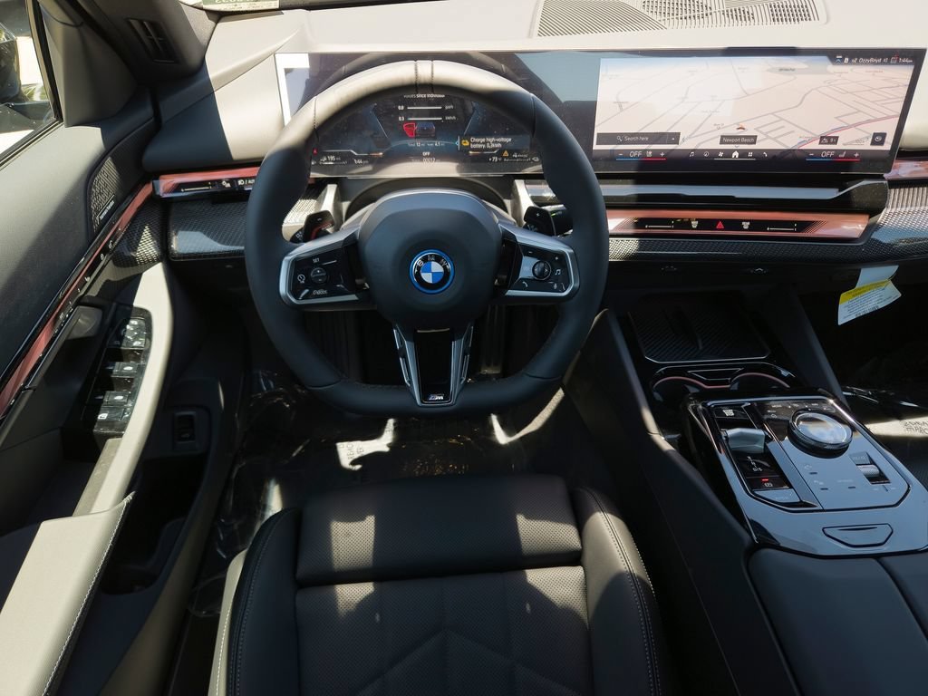 New 2027 Black Sapphire Metallic BMW 550e xDrive image 16