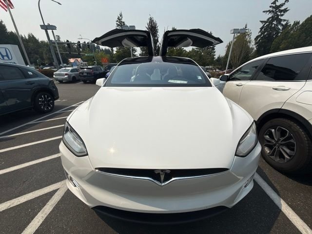 Used 2016 Solid White Tesla  image 9