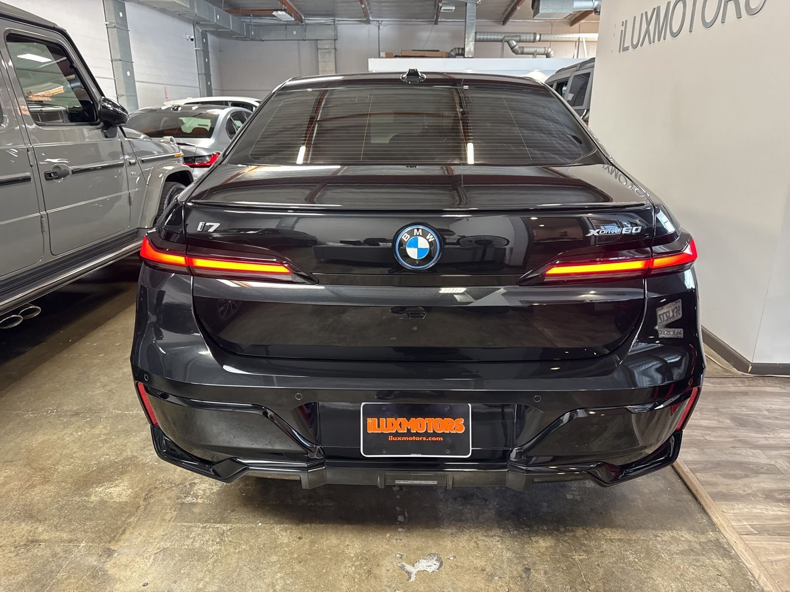 Used 2025 Black BMW xDrive60 image 22