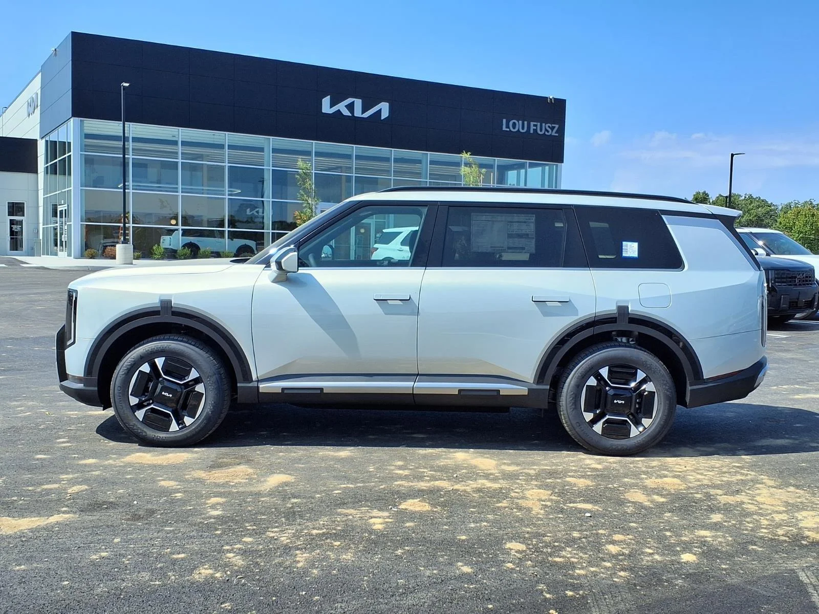New 2027 Ivory Silver KIA EX AWD image 12