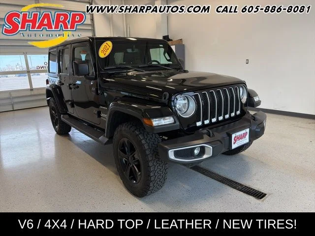 Used 2021 Black Jeep Unlimited Sahara image 1