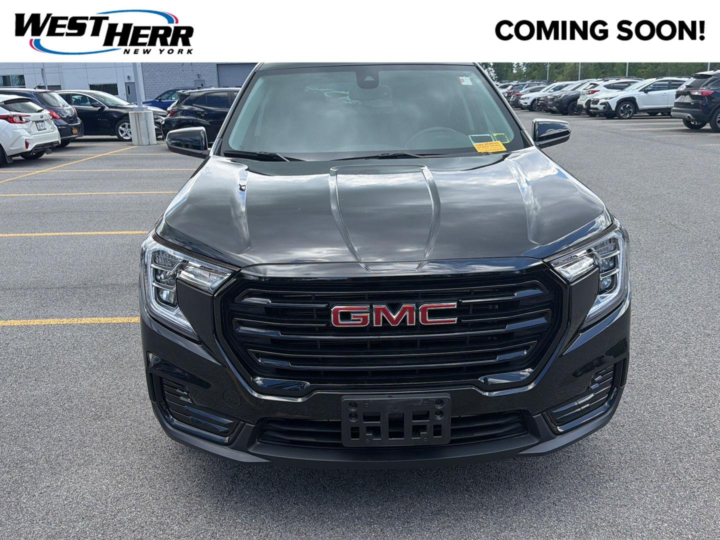 Used 2023 Ebony Twilight Metallic GMC SLE image 1