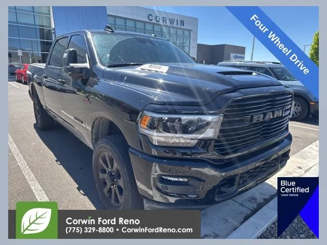 Used 2024 Diamond Black Ram Laramie image 1