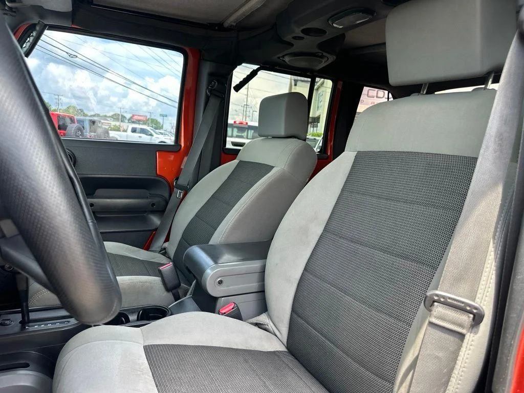 Used 2009 Orange Jeep Unlimited X image 25