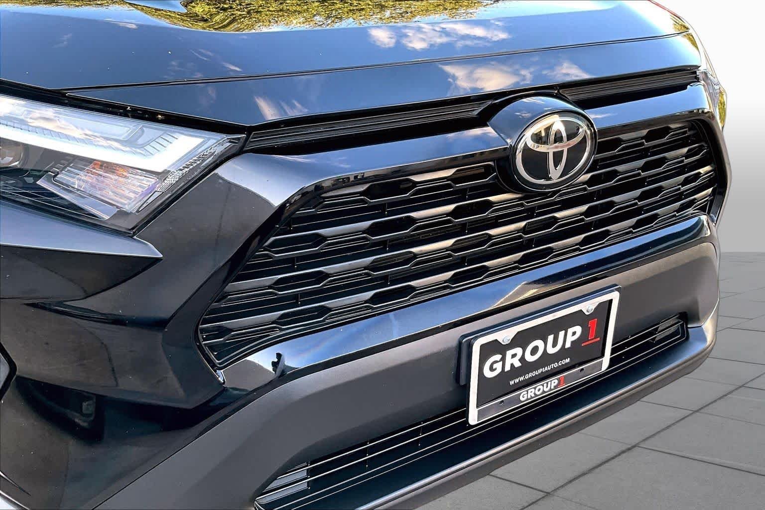 Used 2024 Midnight Black Metallic Toyota LE image 29