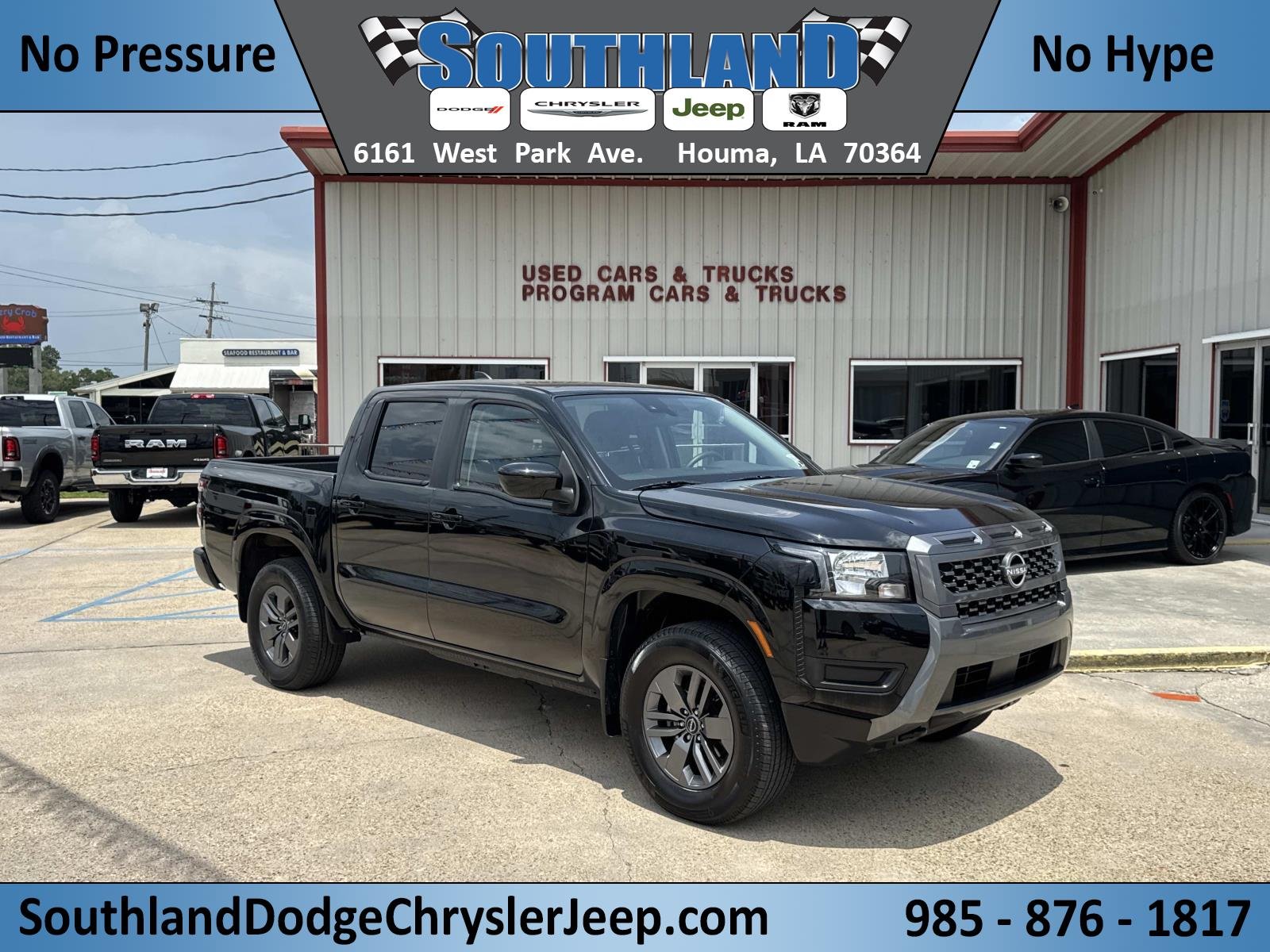 Used 2025 Super Black Nissan SV image 1