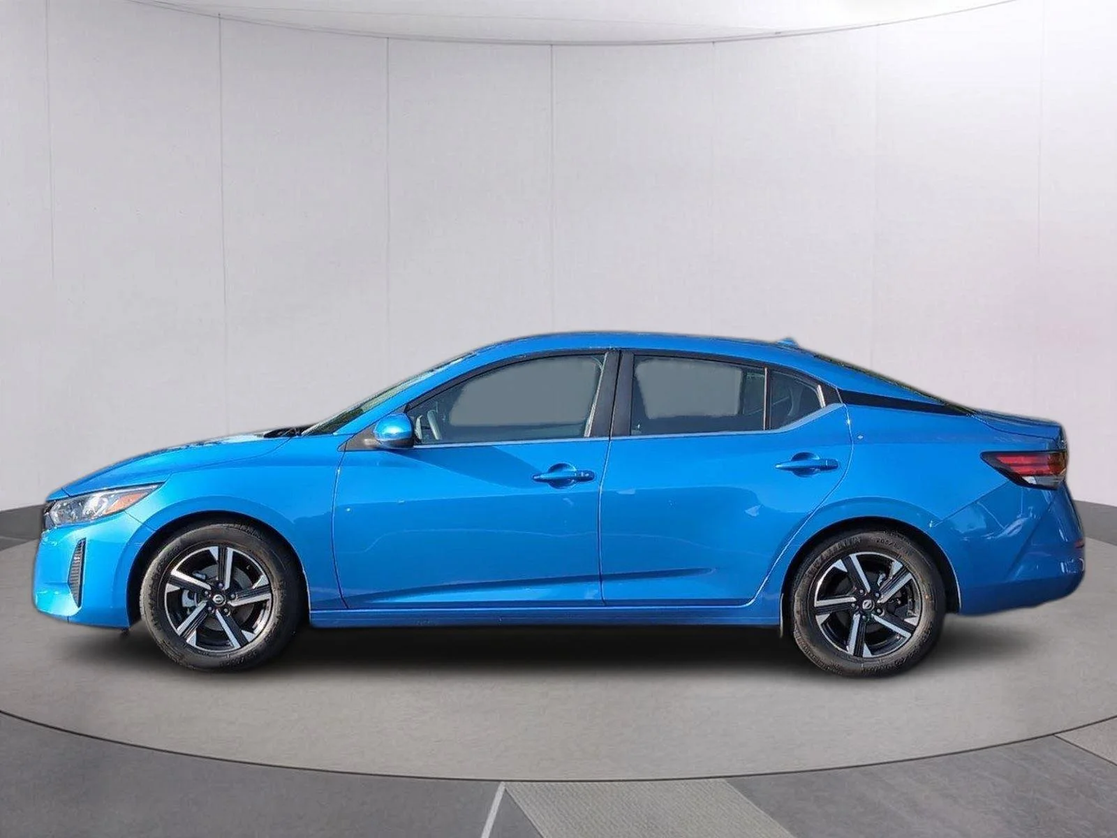 Used 2024 Electric Blue Metallic Nissan SV image 2