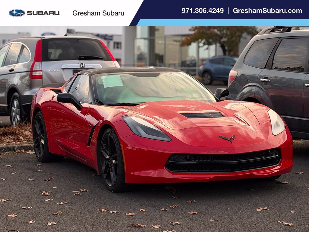Used 2016 Torch Red Chevrolet Stingray Z51 image 1