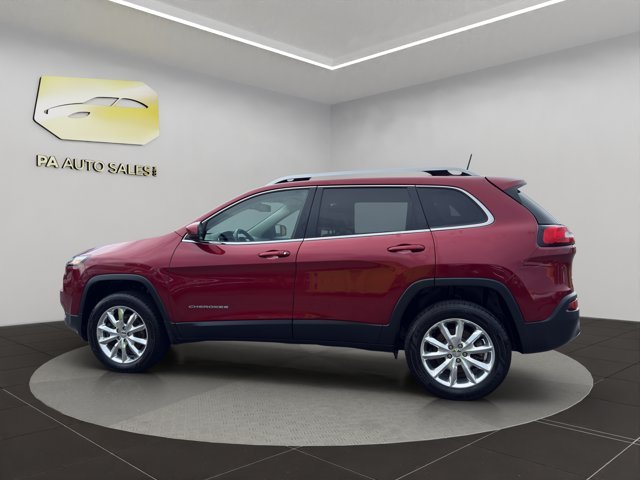Used 2016 Deep Cherry Red Crystal Pearlcoat Jeep Limited image 4